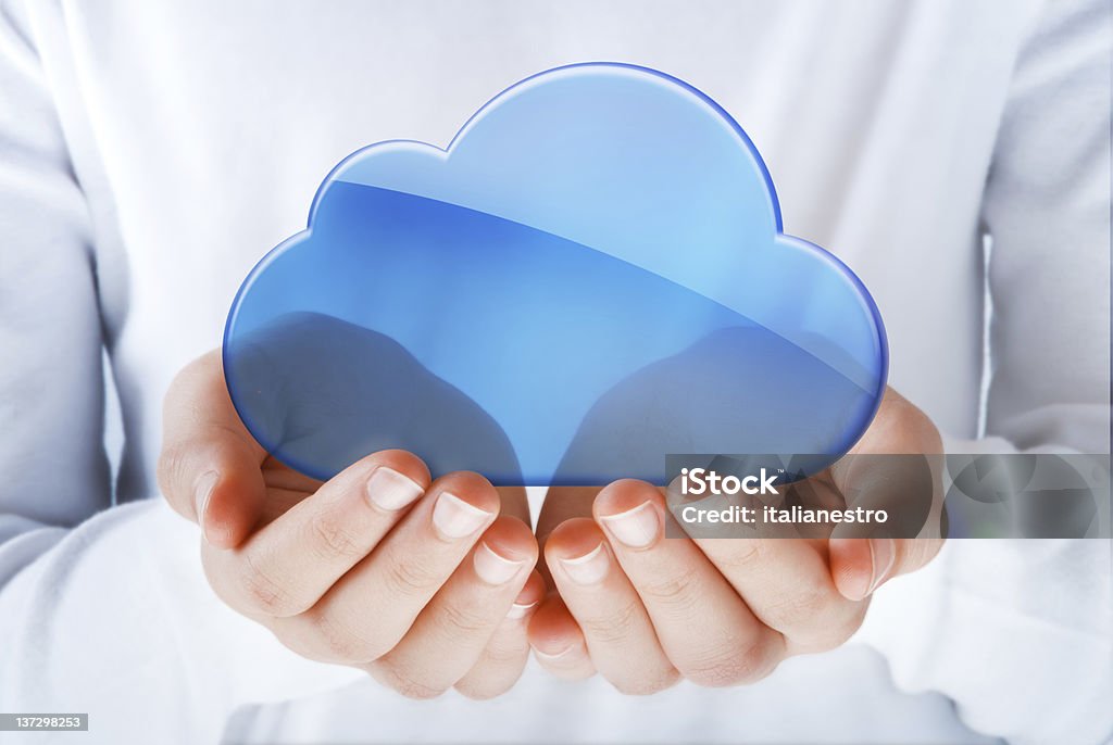 cloud computing hands exhibiting the cloud computing symbol Cloud Computing Stock Photo