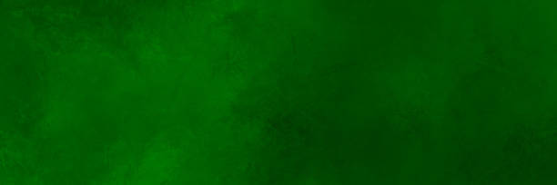 istock Green background with grunge marbled textured pattern elegant luxury emerald color in abstract web banner header template image 1372982766