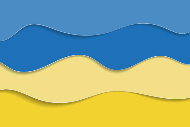 istock Ukrainian flag in paper cut style. Yellow and blue waves background. 1372983013