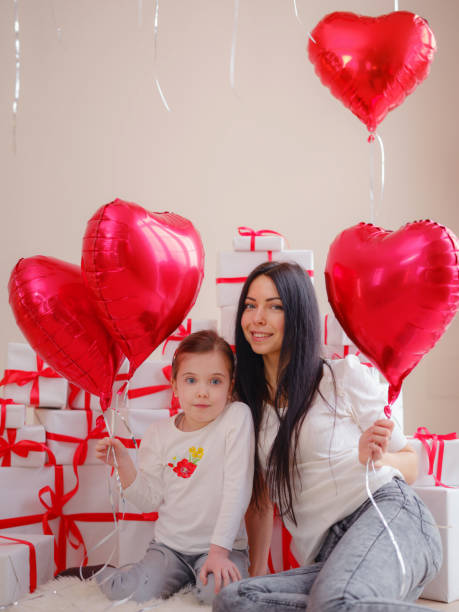 istock Loving mom hug little daughter express love 1372983719