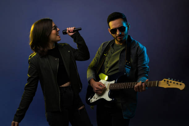 istock Gifted rock musicians singing 1372991074