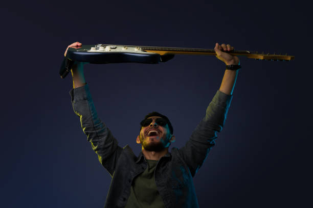 istock Cheerful rock star shouting 1372991218