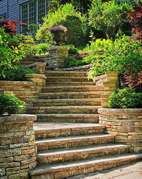Stone stairs landscaping Natural stone stairs landscaping in home garden outdoor staircase stock pictures, royalty-free photos & images