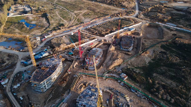 istock Large construction site. Construction of multi-storey buildings has begun. Tower cranes are standing. Aerial photography of construction. 1372994400