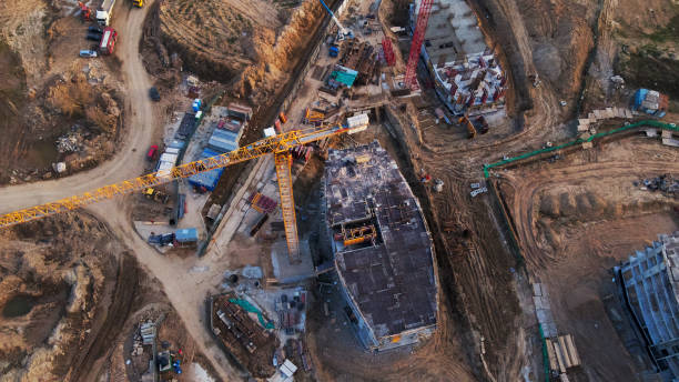 istock Large construction site. Construction of multi-storey buildings has begun. Tower cranes are standing. Aerial photography of construction. 1372994411
