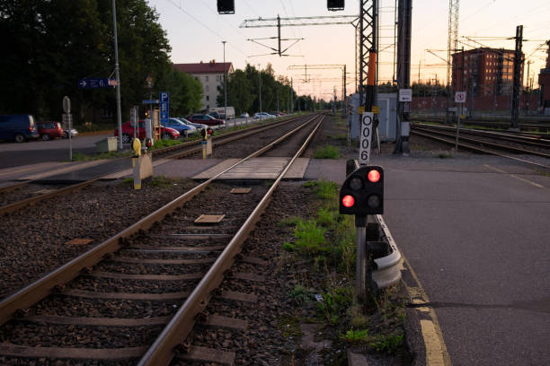 istock Traffic light shows red signal on railway in the nightfall. 1372995719