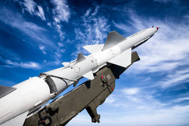 istock Soviet S-75 Dvina - high-altitude, command guided, surface-to-air missile against blue sky 1372995969