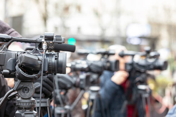 istock Filming media event with a video camera 1372997738