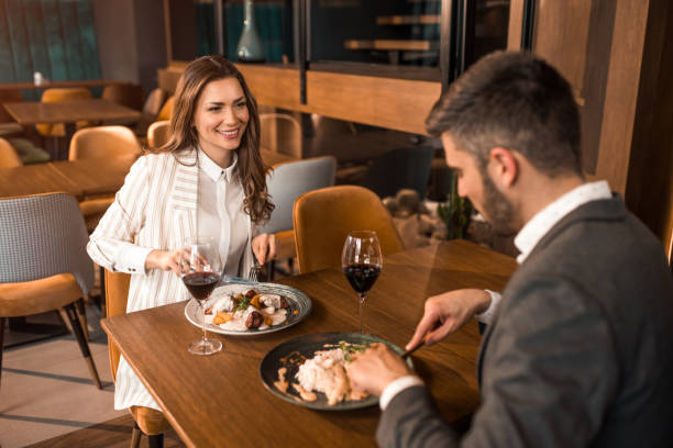 istock Elegant couple eating lunch in a restaurant. 1372999982