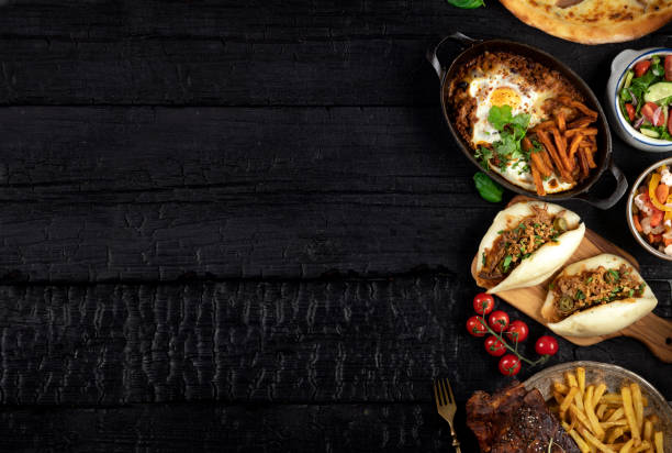 Tasty food Table Classic party dinner table. Above view with copy space restaurant table layout stock pictures, royalty-free photos & images