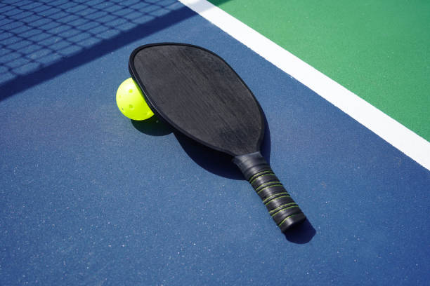 istock Pickleball Paddle on court 1373008487