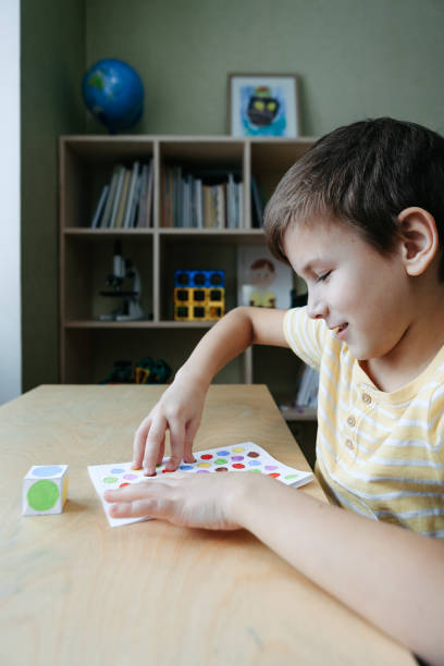 istock Child playing diy dot game for fingers 1373010290