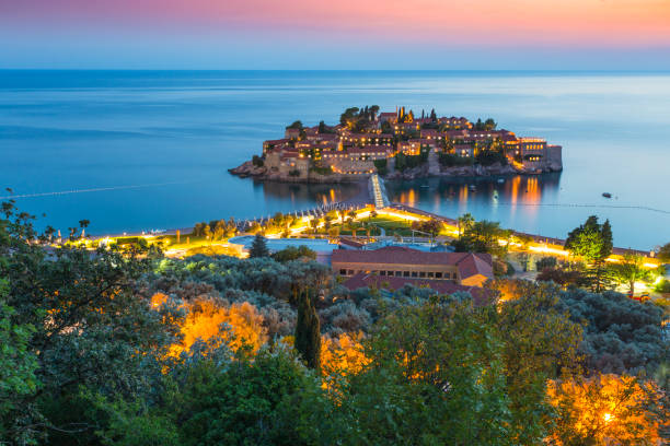 The island of Sveti Stefan in the evening. Montenegro stock photo