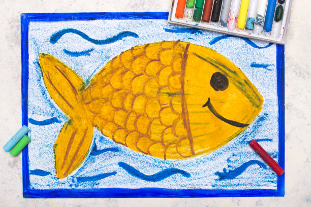 istock Colorful drawing: Goldfish swimming in water. Cute smiling fish 1373015521
