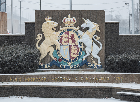 February 25, 2022 - Halifax, Canada - Her Majesty's Canadian Dockyard Coat of Arms. The HMC Dockyard was established as the Royal Naval Dockyard in 1759 and is part of CFB Halifax located on the West side of Halifax Harbour.