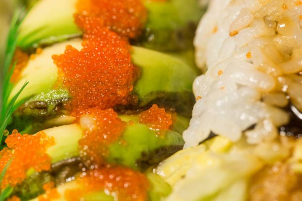 istock tobiko fish roe on top of dragon sushi roll 1373017417
