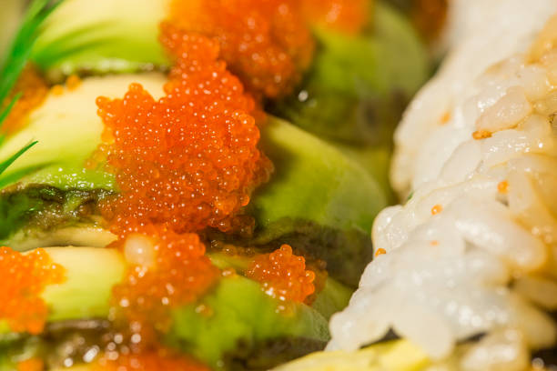 istock tobiko fish roe on top of dragon sushi roll 1373017421