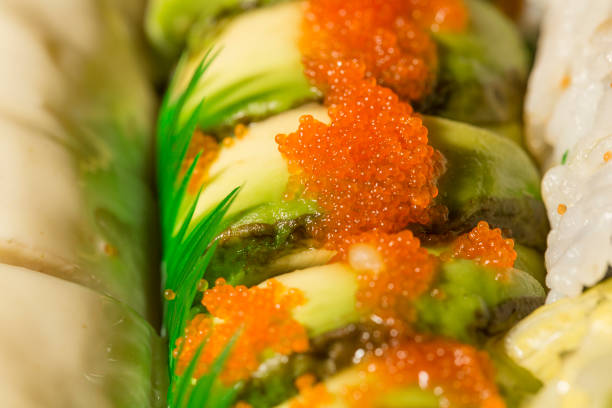 istock tobiko fish roe on top of dragon sushi roll 1373017429