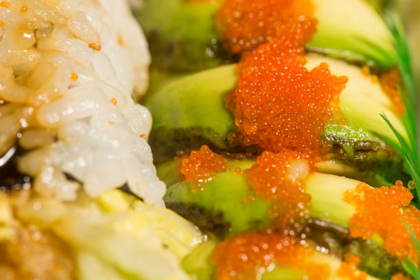istock tobiko fish roe on top of dragon sushi roll 1373017437