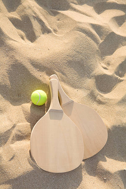 istock beach  racquets and ball 137302602