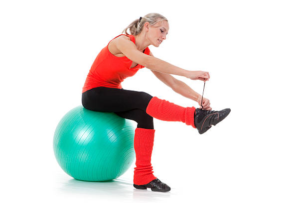 istock Before hard training: woman sitting on  ball. 137302612
