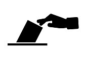 Vote your ballot in the ballot box. Silhouette icon of a voting hand. Editable vector.