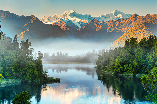 Early morning fog and mist at Lake Matheson but with enough light to capture the reflections of the Southern Alps
