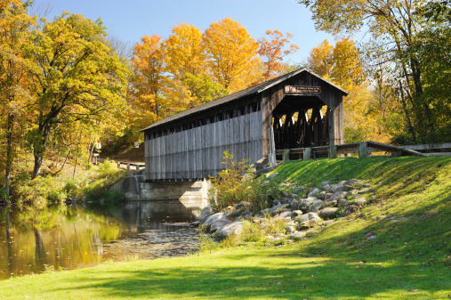 Beautiful Fall colors at Michigan's Historic Fallasburg Covered Bridge. Located in Lowell Michigan, USA