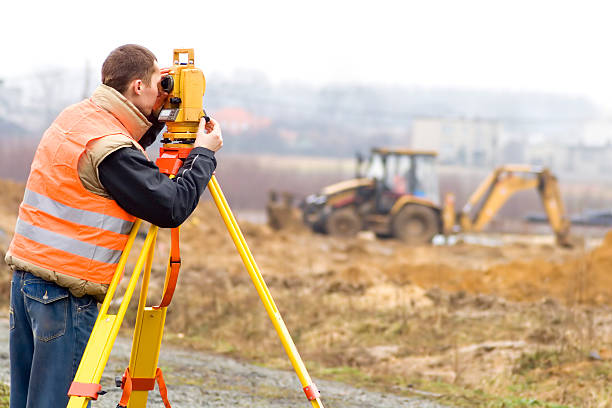 geodeta na plac budowy - tachymeter zdjęcia i obrazy z banku zdjęć