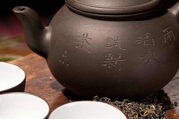 istock chinese green tea pot and cups 137303735