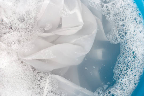 istock Soak a cloth before washing, white cloth 1373039587