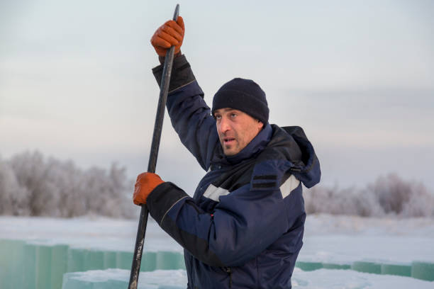 istock An installer with a metal crowbar in his hands 1373040548