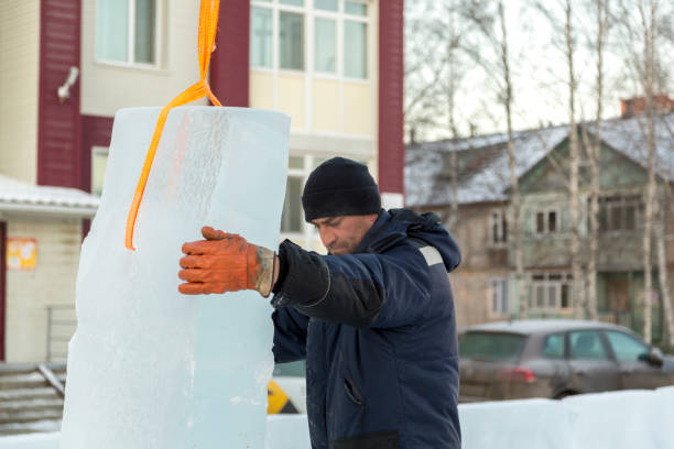 pracownik przy montażu panelu lodowego - slinger zdjęcia i obrazy z banku zdjęć