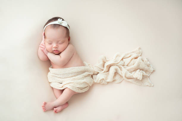 istock newborn baby sleeping 1373044360