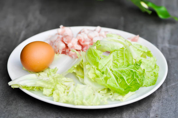 istock egg, minced pork or ground pork and vegetable for cook 1373050374
