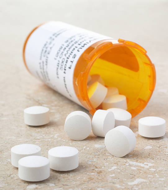 istock Pills From Prescription Bottle 137305653