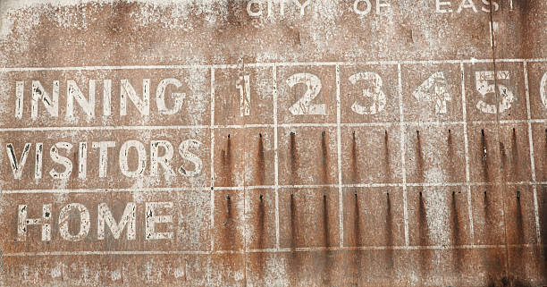 Old baseball scoreboard background Old faded baseball scoreboard background vintage scoreboard stock pictures, royalty-free photos & images
