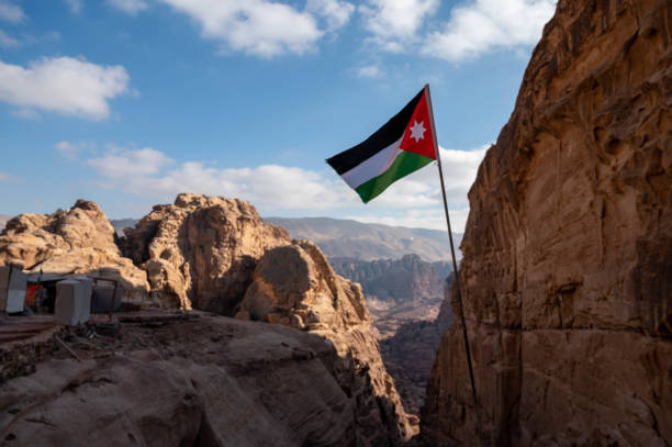 istock Jordanian Flag flying over Petra, Jordan 1373062222