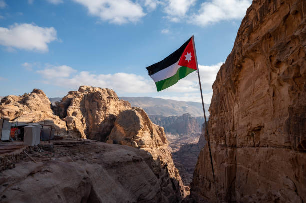 istock Jordanian Flag flying over Petra, Jordan 1373062228