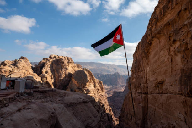 istock Jordanian Flag flying over Petra, Jordan 1373062232