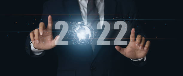 istock Businessman pointing virtual Global Internet connection 2022 and metaverse. 1373064824