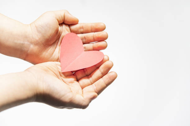 istock The child held love in his hand 1373068305