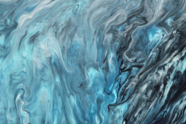 istock Fluid Art. Liquid blue and grey abstract paint drips and wave. Marble effect background or texture 1373070267