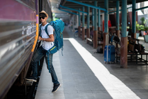 istock Traveler waits train at train station 1373074299
