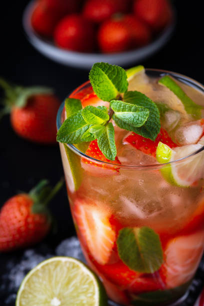 istock Strawberry mojito. Refreshing summer drink with berries, lime and mint 1373075151