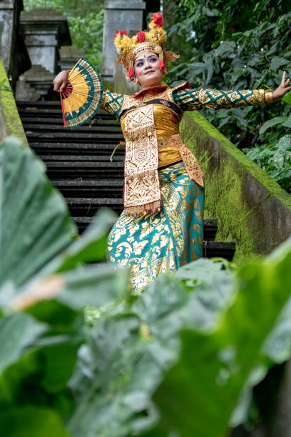 istock Balinese dancer posing in the temple 1373078455
