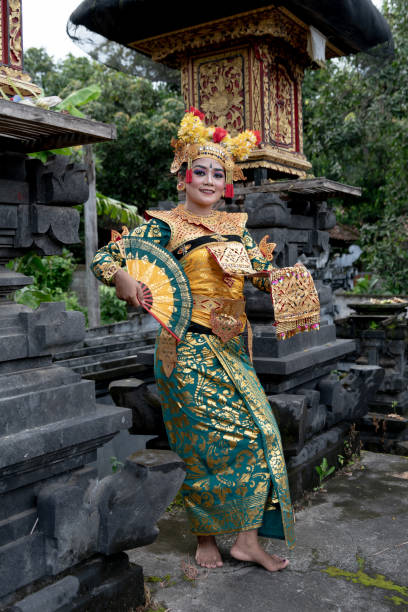 istock Balinese dancer posing in the temple 1373079640