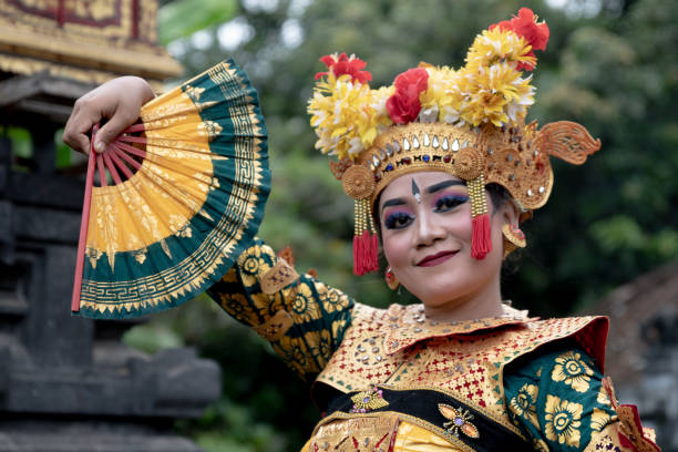 istock Balinese dancer posing in the temple 1373079692