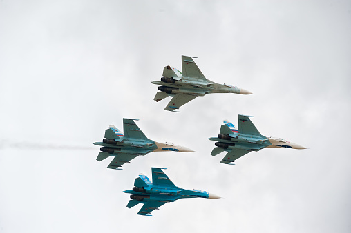 Nizhniy Tagil, Russia - September 25. 2013: fighters SU-27 display of fighting opportunities of equipment with application of aviation means of defeat. RAE-2013 exhibition (Russia Arms Expo-2013)