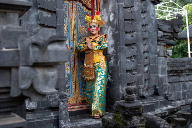 istock Balinese dancer posing in the temple 1373080718